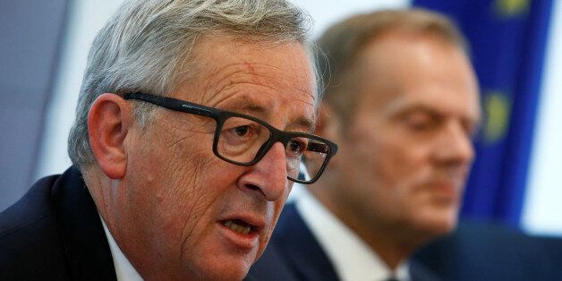 European Commision President Jean-Claude Juncker (L) and European Council President Donald Tusk attend a news conference at the Delegation of the European Union to China in Beijing, July 13, 2016. REUTERS/Thomas Peter