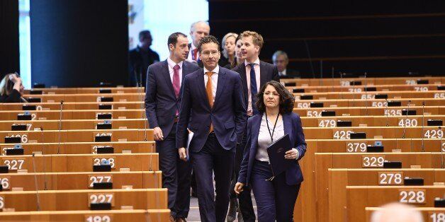 Eurogroup President and Dutch Finance Minister Jeroen Dijsselbloem (C) arrives to address a planery session on the state of play of the second review of the economic adjustment programme for Greece at the European Parliament in Brussels on April 27, 2017. / AFP PHOTO / EMMANUEL DUNAND (Photo credit should read EMMANUEL DUNAND/AFP/Getty Images)