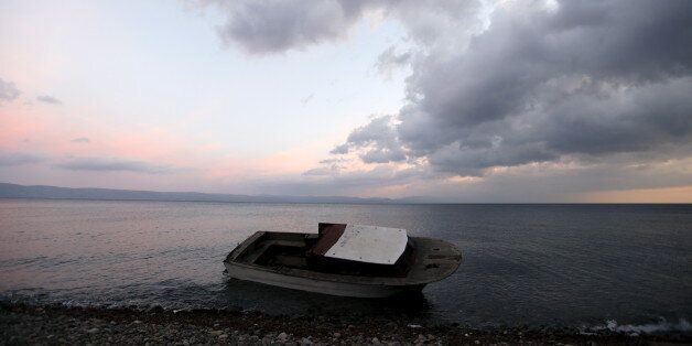 A boat used by refugees and migrants to travel across the Aegean Sea from the Turkish coast in the Greek island of Lesbos is seen at a beach November 21, 2015. Balkan countries have begun filtering the flow of migrants to Europe, granting passage to those fleeing conflict in the Middle East and Afghanistan but turning back others from Africa and Asia, the United Nations and Reuters witnesses said on Thursday. REUTERS/Yannis Behrakis