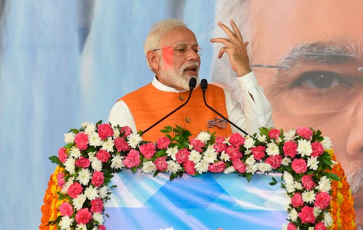 Indian Prime Minister, Narendra Modi (C) gives a speech at Kevadia Colony of Narmada District, some 200 km from Ahmedabad, on September 17, 2019. - Indian Prime Minister Narendra Modi, visited the Sardar Sarovar Dam site on his 69th birthday. (Photo by SAM PANTHAKY / AFP) (Photo credit should read SAM PANTHAKY/AFP/Getty Images)