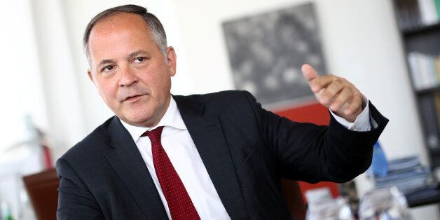 Benoit Coeure, board member of the European Central Bank (ECB), is photographed during an interview with Reuters journalists at the ECB headquarters in Frankfurt, Germany, May 17, 2017. Picture taken May 17, 2017. REUTERS/Kai Pfaffenbach