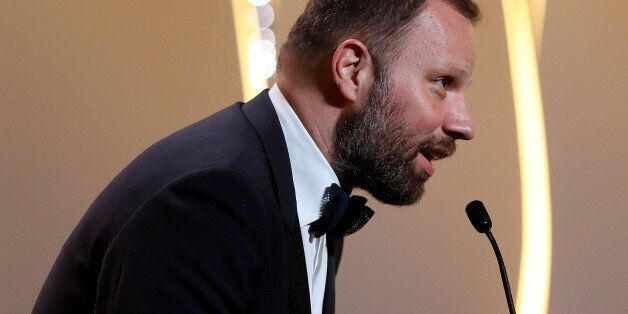 Greek director Yorgos Lanthimos delivers after he was awarded with the Best Screenplay prize for 'The Killing of a Sacred Deer' on May 28, 2017 during the closing ceremony of the 70th edition of the Cannes Film Festival in Cannes, southern France. / AFP PHOTO / Valery HACHE (Photo credit should read VALERY HACHE/AFP/Getty Images)