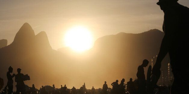 RIO DE JANEIRO, BRAZIL - MARCH 16: People gather on Ipanema beach on March 16, 2017 in Rio de Janeiro, Brazil. According to the Urban Climate Change Research Network (UCCRN), Rio's average temperature would rise around one degree Celsius between 2015 and 2020 along with a sea level rise of 14 cm. Changes in Rio's climate are projected to be the most dire of all cities in South America, according to UCCRN. U.S. President Donald Trump proposed a budget today that would significantly cut scientific and diplomatic efforts to study climate change. (Photo by Mario Tama/Getty Images)