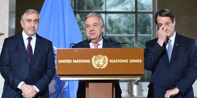 UN Secretary-General Antonio Guterres (C) speaks as Turkish Cypriot leader Mustafa Akinci (L) and Greek Cypriot President Nicos Anastasiades (R) listen on during a press conference following the UN-sponsored Cyprus peace talks on January 12, 2017 in Geneva. / AFP / POOL / LAURENT GILLIERON (Photo credit should read LAURENT GILLIERON/AFP/Getty Images)