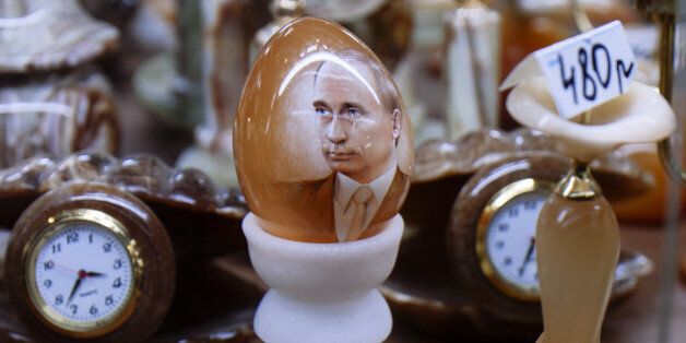 A decorative egg painted with the portrait of Vladimir Putin for sale in a jewellery shop in Moscow.