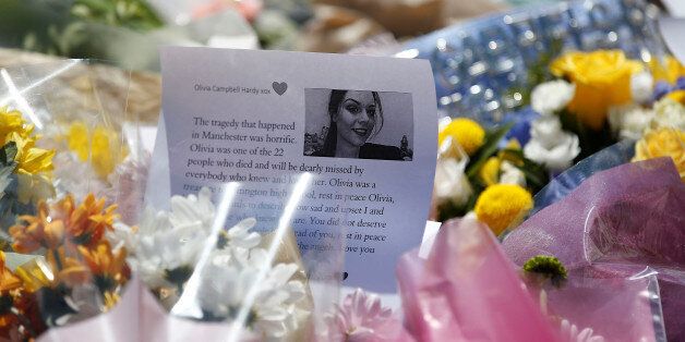Flowers are left outside Tottington high school, in memory of pupil Olivia Campbell who was killed during the Manchester Arena attack, Bury, Manchester, Britain, May 26, 2017. REUTERS/Andrew Yates