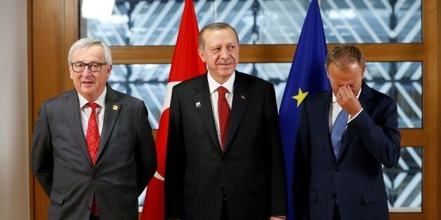 (From L) President-of the EU Commission Jean-Claude Juncker, Turkish President Recep Tayyip Erdogan and European Council President Donald Tusk pose during a meeting at the EU headquarters, on the sidelines of the NATO (North Atlantic Treaty Organization) summit, in Brussels, on May 25, 2017. / AFP PHOTO / POOL / FRANCOIS LENOIR (Photo credit should read FRANCOIS LENOIR/AFP/Getty Images)