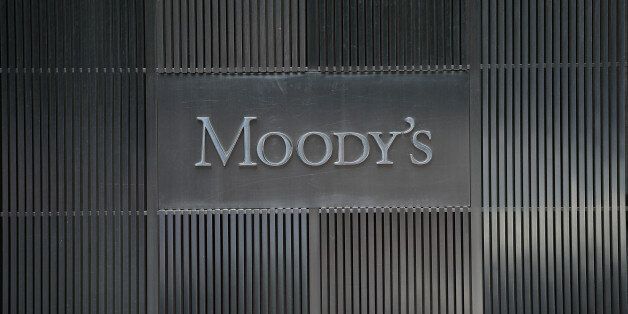 A sign for Moody's rating agency is displayed at the company headquarters in New York, September 18, 2012. AFP PHOTO/Emmanuel Dunand / AFP / EMMANUEL DUNAND (Photo credit should read EMMANUEL DUNAND/AFP/Getty Images)