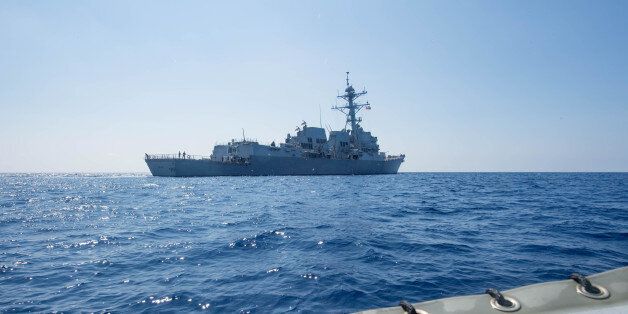 Arleigh Burke-class guided-missile destroyer USS Dewey transits the South China Sea May 6, 2017. Picture taken May 6, 2017. Kryzentia Weiermann/Courtesy U.S. Navy/Handout via REUTERS ATTENTION EDITORS - THIS IMAGE WAS PROVIDED BY A THIRD PARTY. EDITORIAL USE ONLY