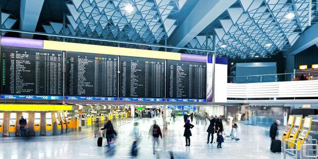 Airport Departure Board over the check-in counters