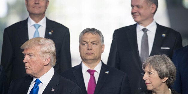 BRUSSELS, BELGIUM - MAY 25: US President Donald Trump (front left) and Prime Minister Theresa May (front right) during the North Atlantic Treaty Organisation (NATO) summit on May 25, 2017 in Brussels, Belgium. (Photo by Stefan Rousseau - Pool/Getty Images)