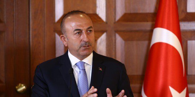 ANKARA, TURKEY - APRIL 19: Turkish Foreign Minister Mevlut Cavusoglu delivers a speech during a joint press conference with Dominican Foreign Minister Miguel Vargas (not seen) after they signed the declaration of will at Foreign Ministry Official Residence in Ankara, Turkey on April 19, 2017. (Photo by Cem Ozdel/Anadolu Agency/Getty Images)