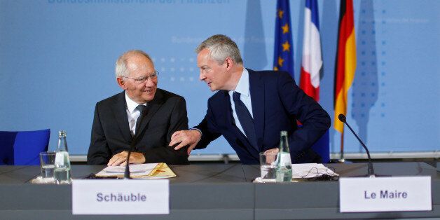 German Finance Minister Wolfgang Schaeuble and French Economy Minister Bruno Le Maire attend a news conference in Berlin, Germany, May 22, 2017. REUTERS/Hannibal Hanschke