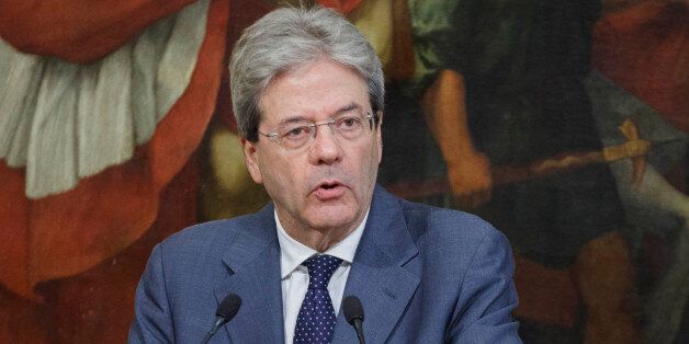 Italian Prime Minister Paolo Gentiloni signs a Presidential Decree for a long-term plan involving considerable resources and investment for growth, infrastructure and technology for 47 billion for the next 15 years at Chigi Palace in Rome, Italy on May 29, 2017.(Photo by Giuseppe Ciccia/NurPhoto via Getty Images)