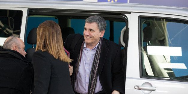 Euclid Tsakalotos, Greece's finance minister, arrives for a Eurogroup meeting of euro-area finance ministers at the Europa building in Brussels, Belgium, on Thursday, Jan. 26, 2017. Greece has less than a month to iron out disagreements with its creditors over how to move forward with a rescue package that has been keeping the country afloat since 2010. Photographer: Jasper Juinen/Bloomberg via Getty Images