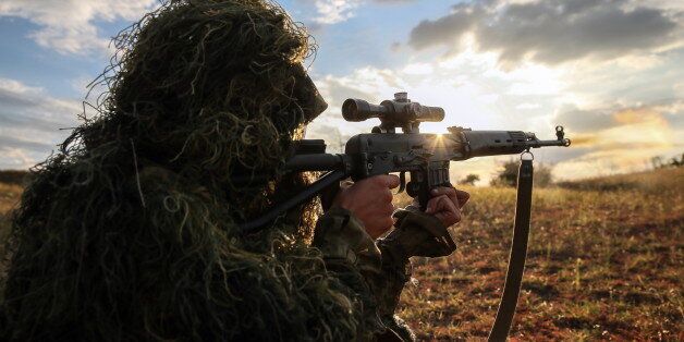 STAVROPOL TERRITORY, RUSSIA - SEPTEMBER 7, 2016: A sniper seen during tactical exercises held by motorized infantry units of Russia's Southern Military District as part of the Caucasus 2016 strategic drills, at Sernovodsky range. Sergei Savostyanov/TASS (Photo by Sergei Savostyanov\TASS via Getty Images)