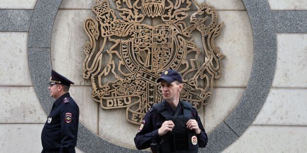 Russian police officers stand guard outside the British embassy in Moscow on May 23, 2017.Russian President Vladimir Putin said he was ready to boost anti-terror cooperation with Britain in a condolence message to Prime Minister Theresa May over the 'inhuman' attack in Manchester, the Kremlin said on May 23. / AFP PHOTO / Vasily MAXIMOV (Photo credit should read VASILY MAXIMOV/AFP/Getty Images)