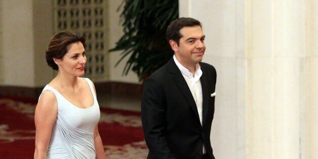 BEIJING, CHINA - MAY 14: (RUSSIA OUT) Greek Prime Minister Alexis Tsipras and his wife Betty Baziana arrive to the dinner during the Belt and Road Forum for International Cooperation in Beijing, China, May 14, 2017. (Photo by Mikhail Svetlov/Getty Images)