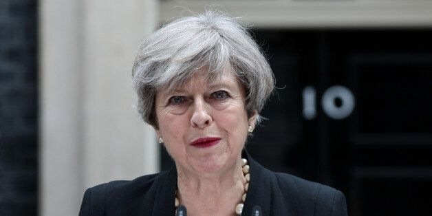 Theresa May, U.K. prime minister, delivers a statement outside number 10 Downing Street in London, U.K., on Tuesday, May 23, 2017.Â At least 22 people were killed in a suicide bombing at a pop concert packed with children in the northern English city of Manchester, in the worst terror incident on British soil since the London bombings of 2005. Photographer: Simon Dawson/Bloomberg via Getty Images