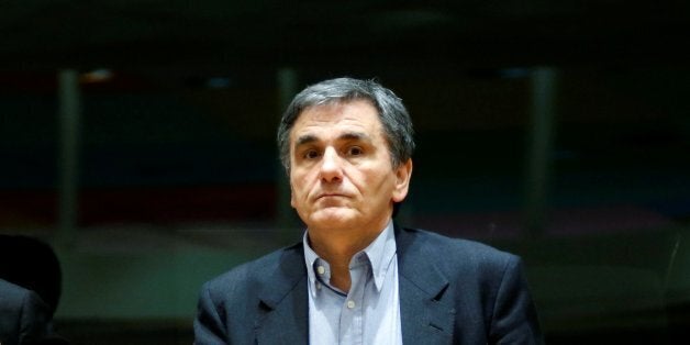 Greek Finance Minister Euclid Tsakalotos attends a eurozone finance ministers meeting in Brussels, Belgium February 20, 2017. REUTERS/Francois Lenoir