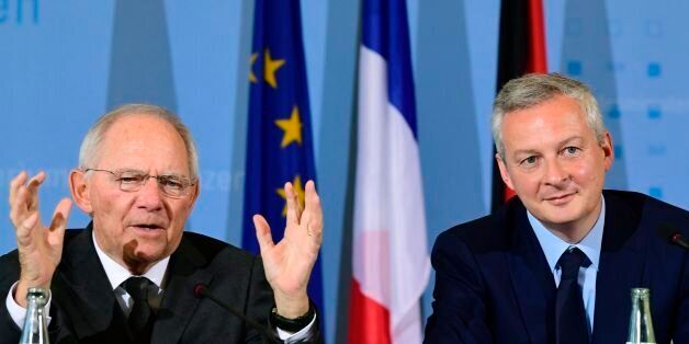 German Finance Minister Wolfgang Schaeuble (L) and the new French Economy minister Bruno le Maire give a press conference on May 22, 2017 in Berlin. / AFP PHOTO / Tobias SCHWARZ (Photo credit should read TOBIAS SCHWARZ/AFP/Getty Images)
