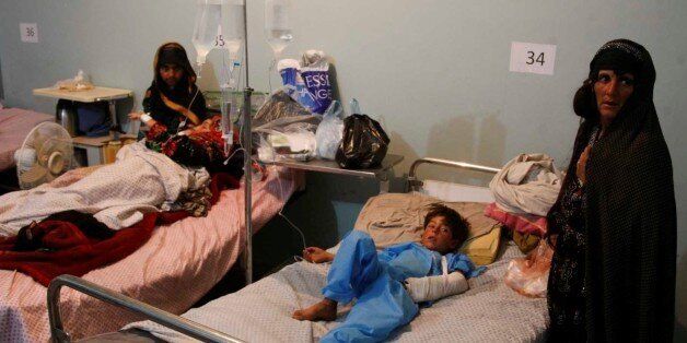 HERAT, AFGHANISTAN - MAY 27: Woundeds receive treatment at hospital after the blast killing at least 10 civilians in Adraskan district of Herat, Afghanistan on May 27, 2017. (Photo by Mir Ahmad Firooz/Anadolu Agency/Getty Images)