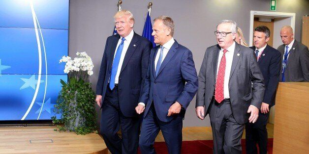 BRUSSELS, BELGIUM - MAY 25 : U.S. President Donald Trump (L) meets European Council President Donald Tusk (C) and EU Commission president Jean-Claude Juncker (R) as part of the NATO summit, in Brussels, Belgium on May 25, 2017. (Photo by Dursun Aydemir/Anadolu Agency/Getty Images)