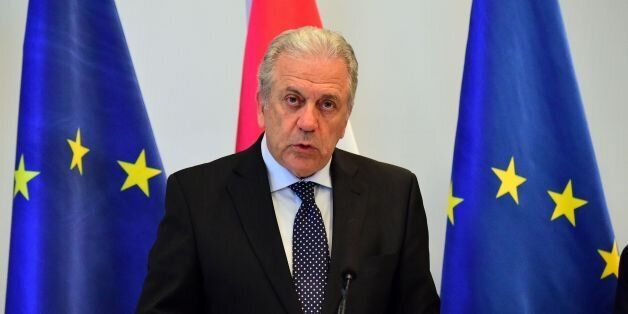 European Commissioner for Migration, Home Affairs and Citizenship Greek Dimitris Avramopoulos and his host Hungarian Interior Minister (unseen) give a press statement after a meeting in Budapest on March 28, 2017. From today, asylum-seekers entering Hungary as well as those currently in the country will be confined in camps at the its southern borders while their applications are processed. / AFP PHOTO / ATTILA KISBENEDEK (Photo credit should read ATTILA KISBENEDEK/AFP/Getty Images)