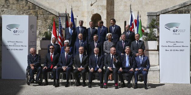 Financial ministers and bank governors pose for a family photo during the G7 for Financial ministers meeting in the southern Italian city of Bari, Italy May 13, 2017. REUTERS/Alessandro Bianchi