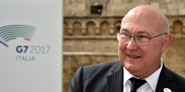 France's Finance Minister Michel Sapin is pictured during a pause at the G7 summit of Finance Ministers on May 12, 2017 in Bari. / AFP PHOTO / Alberto PIZZOLI (Photo credit should read ALBERTO PIZZOLI/AFP/Getty Images)
