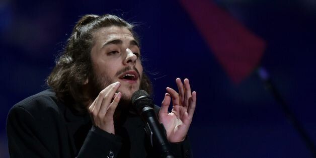 Portuguese singer representing Portugal with the song 'Amar Pelos Dios' Salvador Vilar Braamcamp Sobral aka Salvador Sobral performs on stage during the final of the 62nd edition of the Eurovision Song Contest 2017 Grand Final at the International Exhibition Centre in Kiev, on May 13, 2017. / AFP PHOTO / SERGEI SUPINSKY (Photo credit should read SERGEI SUPINSKY/AFP/Getty Images)