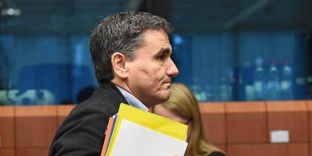 Greece's Finance Minister Euclid Tsakalotos arrives for an Eurogroup Finance Ministers' meeting at the European Council, in Brussels on November 9, 2015. AFP PHOTO/Emmanuel Dunand (Photo credit should read EMMANUEL DUNAND/AFP/Getty Images)