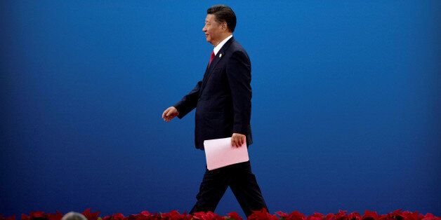 Chinese President Xi Jinping leaves the stage after speaking during the opening ceremony of the Belt and Road Forum at the China National Convention Center (CNCC) in Beijing, May 14, 2017. REUTERS/Mark Schiefelbein/Pool