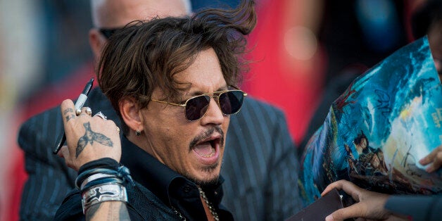 Actor Johnny Depp arrives for the world premiere of Disney movie 'Pirates of the Caribbean: Dead Men Tell No Tales' in Shanghai on May 11, 2017. / AFP PHOTO / Johannes EISELE (Photo credit should read JOHANNES EISELE/AFP/Getty Images)