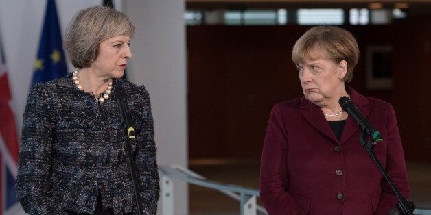 File photo dated 18/11/16 of Theresa May (left) and Angela Merkel, as the German Chancellor has stepped up pressure on the Prime Minister over Brexit by saying that the European Union must consider limiting UK access to the single market if it fails to accept free movement of EU citizens.