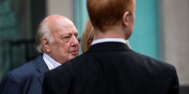 NEW YORK, NY - JULY 19: Security stands in front of Fox News chairman Roger Ailes as he leaves the News Corp building, July 19, 2016 in New York City. As of late Tuesday afternoon, Ailes and 21st Century Fox are reportedly in discussions concerning his departure from his position as chairman of Fox News. (Photo by Drew Angerer/Getty Images)