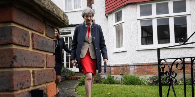 LONDON, ENGLAND - MAY 20: Prime Minister Theresa May goes canvassing in Ealing on May 20, 2017 in London, England. Britain will vote in a general election on June 8. (Photo by Toby Melville - Pool / Getty Images)