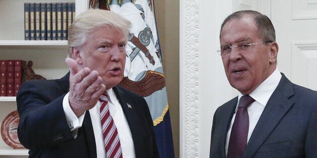 WASHINGTON, D.C., USA - MAY 10, 2017: President Donald Trump (L) of the United States and Russia's Foreign Minister Sergei Lavrov meet for talks in the Oval Office at the White House. Alexander Shcherbak/TASS (Photo by Alexander Shcherbak\TASS via Getty Images)