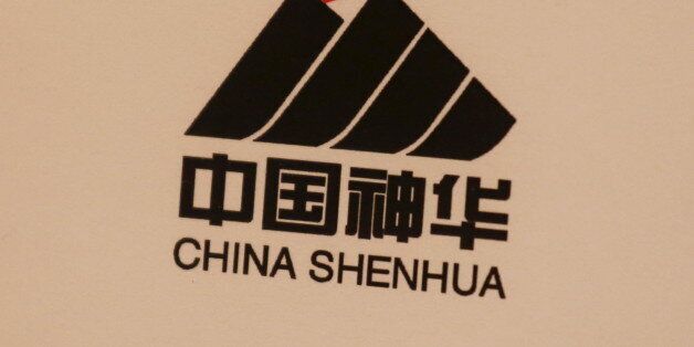 The company logo of China Shenhua Energy Co Ltd is displayed during a news conference following the company's annual results in Hong Kong, China March 29, 2016. REUTERS/Bobby Yip