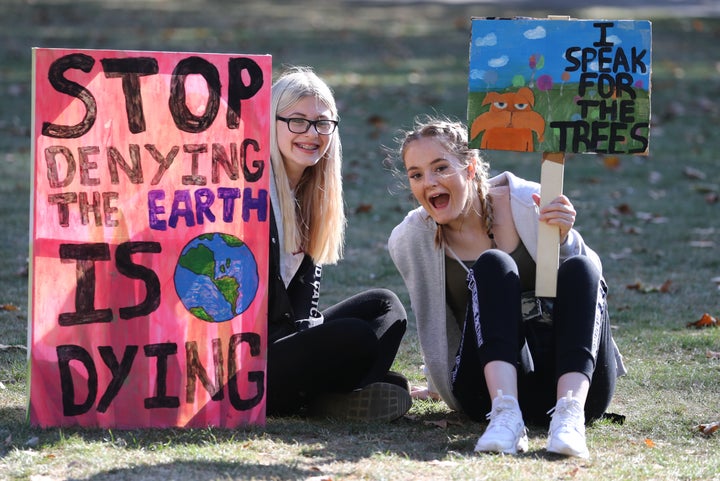 Protesters begin to gather ahead of the UK Student Climate Network's Global Climate Strike at Millbank in London. (Photo by Gareth Fuller/PA Images via Getty Images)