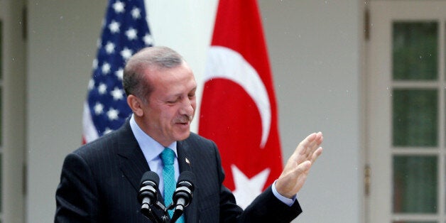 FILE PHOTO - U.S. President Barack Obama (R) and Turkish Prime Minister Recep Tayyip Erdogan hold a joint news conference in the White House Rose Garden in Washington, May 16, 2013. REUTERS/Jason Reed/File Photo