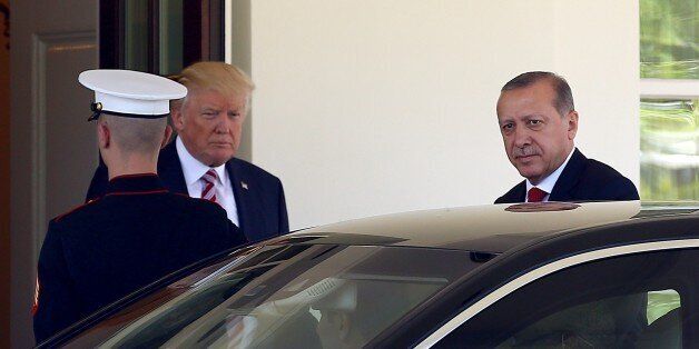 WASHINGTON, USA - MAY 16: U.S President Donald Trump (L) accompanies President of Turkey Recep Tayyip Erdogan (R) as he leaves the White House after their meeting at the Oval Office of the White House in Washington, United States on May 16, 2017. (Photo by Volkan Furuncu/Anadolu Agency/Getty Images)