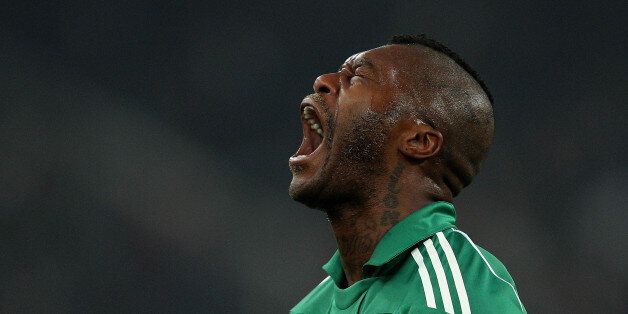 ATHENS, GREECE - FEBRUARY 13: Djibril Cisse of Panathinaikos celebrates after scoring his team's third goal during the Super League match between Panathinaikos and AEK at OAKA stadium on February 13, 2011 in Athens, Greece. (Photo by Vladimir Rys/Getty Images)