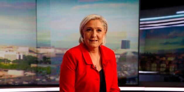 Former French presidential election candidate for the far-right Front National (FN) party Marine Le Pen poses prior to an interview on the evening news broadcast of French TV channel TF1, on May 18, 2017, in Boulogne-Billancourt, near Paris, ahead of the upcoming French legislative election. / AFP PHOTO / POOL / FRANCOIS GUILLOT (Photo credit should read FRANCOIS GUILLOT/AFP/Getty Images)