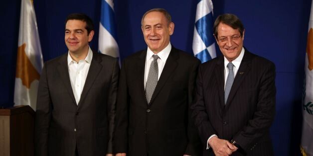 Israeli Prime Minister Benjamin Netanyahu (C), Greek Prime Minister Alexis Tsipras (L) and Cypriot President Nicos Anastasiades (R) are seen during a trilateral meeting in Jerusalem to discuss eastern Mediterranean oil and gas on December 8, 2016. / AFP / GALI TIBBON (Photo credit should read GALI TIBBON/AFP/Getty Images)