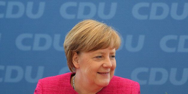 Angela Merkel, Germany's chancellor and leader of the Christian Democratic Union (CDU), reacts during a news conference in Berlin, Germany, on Monday, May 15, 2017. Merkel told reporters on Monday that her Christian Democratic Union won the vote in North Rhine-Westphalia on Sunday by focusing on local topics that mattered to voters such as internal security and improving the infrastructure. Photographer: Krisztian Bocsi/Bloomberg via Getty Images