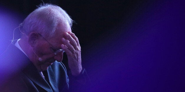 Wolfgang Schaeuble, Germany's finance minister, reacts before speaking during the B20 Summit, a business forum linked to Germany's G-20 presidency, in Berlin, Germany, on Tuesday, May 2, 2017. Ultra-loose monetary policy may increase risk of another crisis, Schaeuble said during the business summit. Photographer: Krisztian Bocsi/Bloomberg via Getty Images