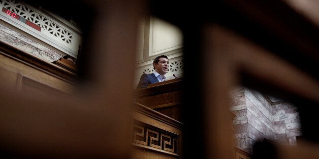Greek Prime Minister Alexis Tsipras addresses his lawmakers during a session of the ruling Syriza party parliamentary group at the parliament in Athens, Greece May 5, 2017. REUTERS/Alkis Konstantinidis