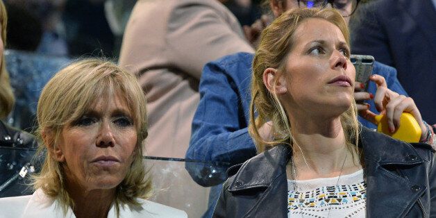 PARIS, FRANCE - APRIL 17: Brigitte Trogneux (L), the wife of Emmanuel Macron, French Presidential Candidate and her daughter Tiphaine Auziere (R) attend Emmanuel Macron political meeting on April 17, 2017 in Paris, France. Thousands of supporters gathered at the Accorhotels Arena to hear Macron speak just 6 days before the first round of presidential elections in France (Photo by Aurelien Meunier/Getty Images)