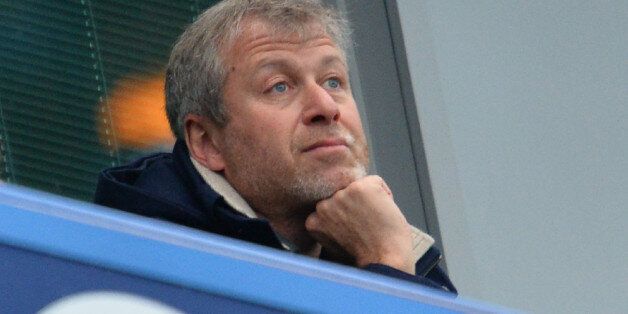 Chelsea's Russian owner Roman Abramovich watches the FA cup fifth round football match between Chelsea and Manchester City at Stamford Bridge in London on February 21, 2016. / AFP / GLYN KIRK / RESTRICTED TO EDITORIAL USE. No use with unauthorized audio, video, data, fixture lists, club/league logos or 'live' services. Online in-match use limited to 75 images, no video emulation. No use in betting, games or single club/league/player publications. / (Photo credit should read GLYN KIRK/AFP/Getty Images)